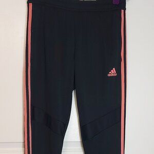 Adidas tracksuit bottoms with pink stripes and ankle zip
